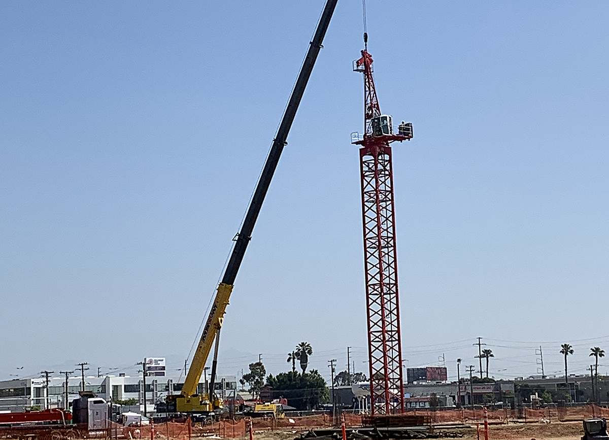 The first tower crane at the Consolidated Rent-A-Car Facility