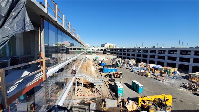 AIRPORT POLICE FACILITY CONSTRUCTION CONTINUES AS WORK BEGINS ON PASEO
