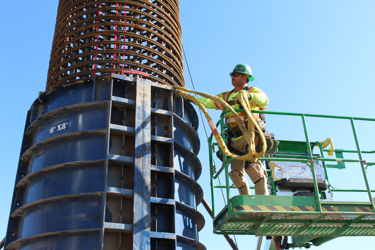 Formwork is placed around a column cage is inspected