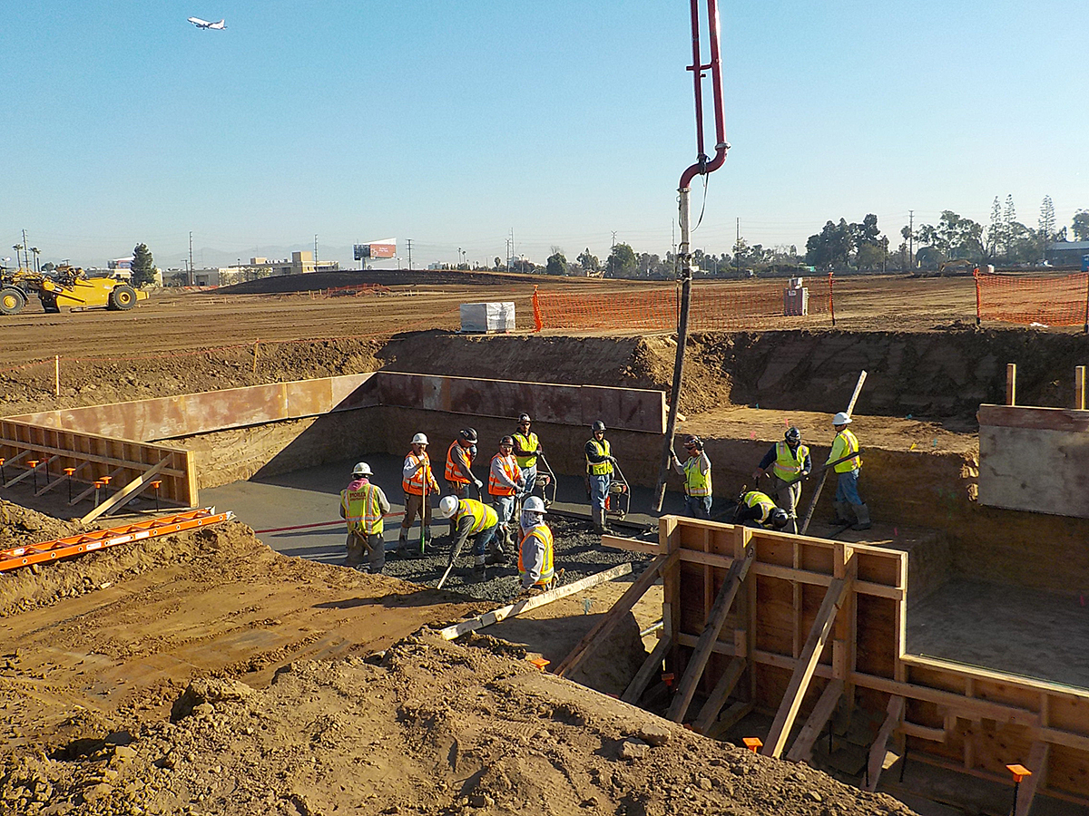 First structural concrete pour at site of the Consolidated Rent-A-Car Facility