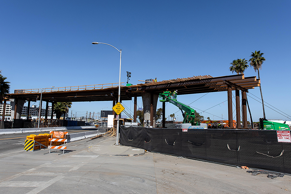 Falsework spans 96th street to allow for traffic circulation as guideway construction continues.