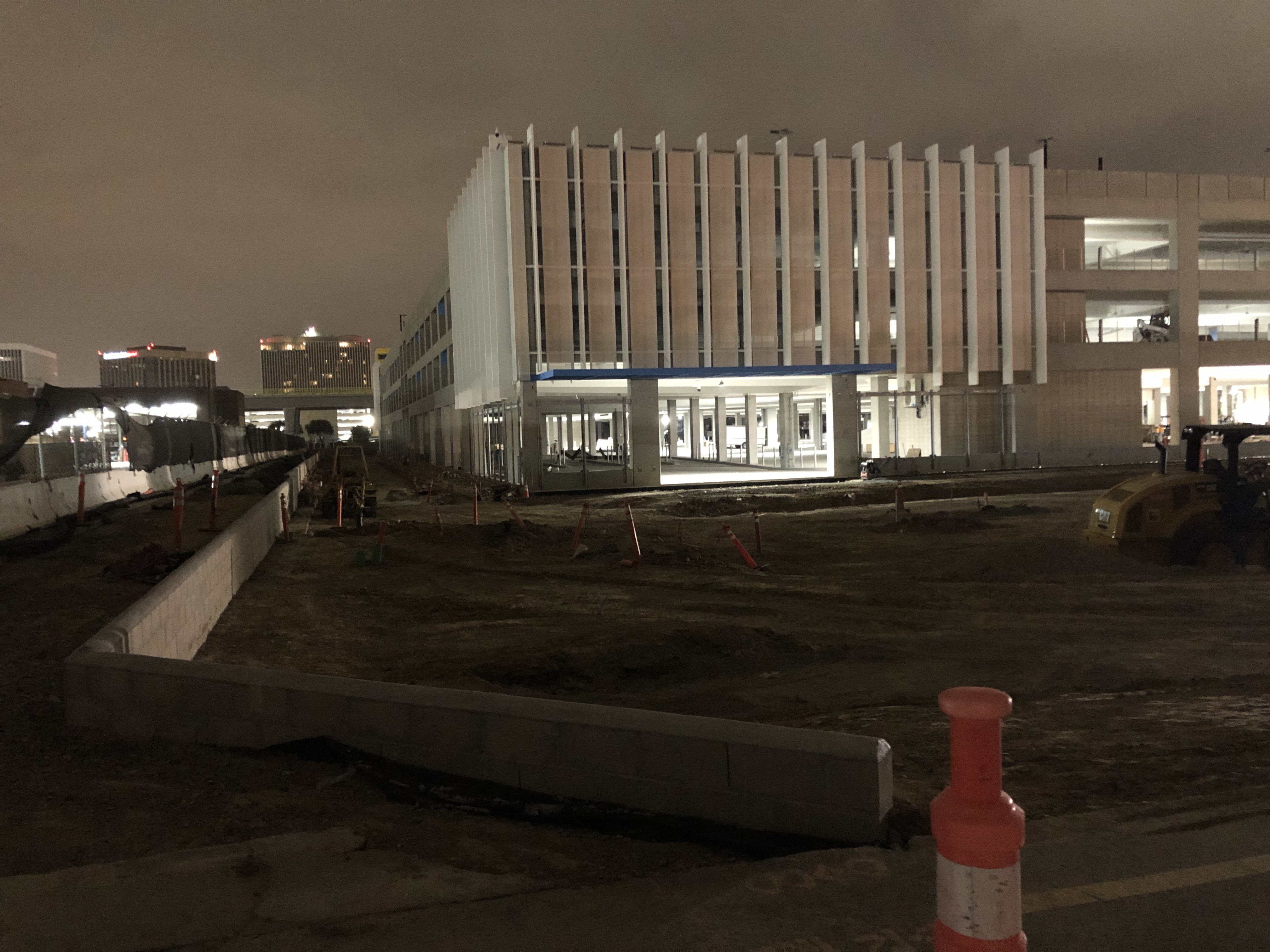 A nighttime view of the northeast corner of the Intermodal Transportation Facility-West where vehicles will exit the structure.