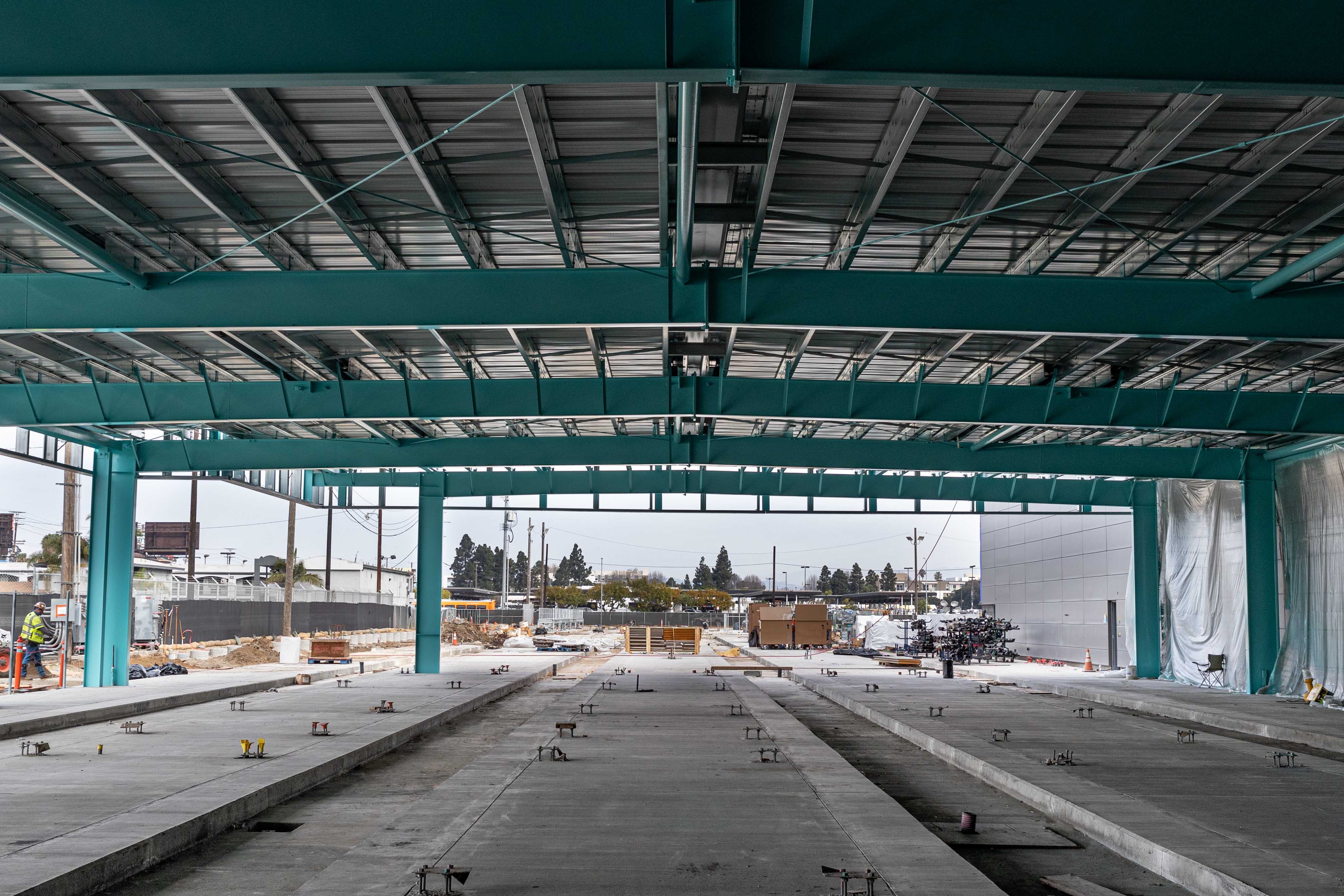 Paint application has begun on the train canopy over the storage tracks at the future APM Maintenance and Storage Facility.