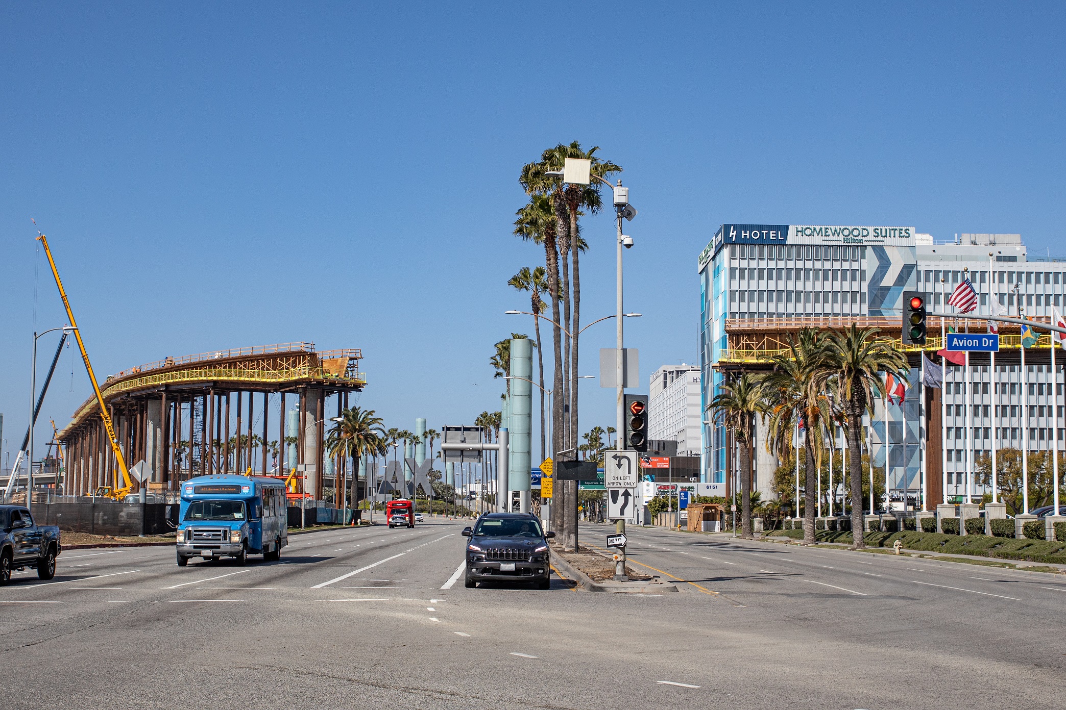 Once construction of the Automated People Mover guideway superstructure to the north and south of Century Boulevard is complete, crews will span the roadway using a cast-in-place technique that utilizes a traveling form instead of falsework.