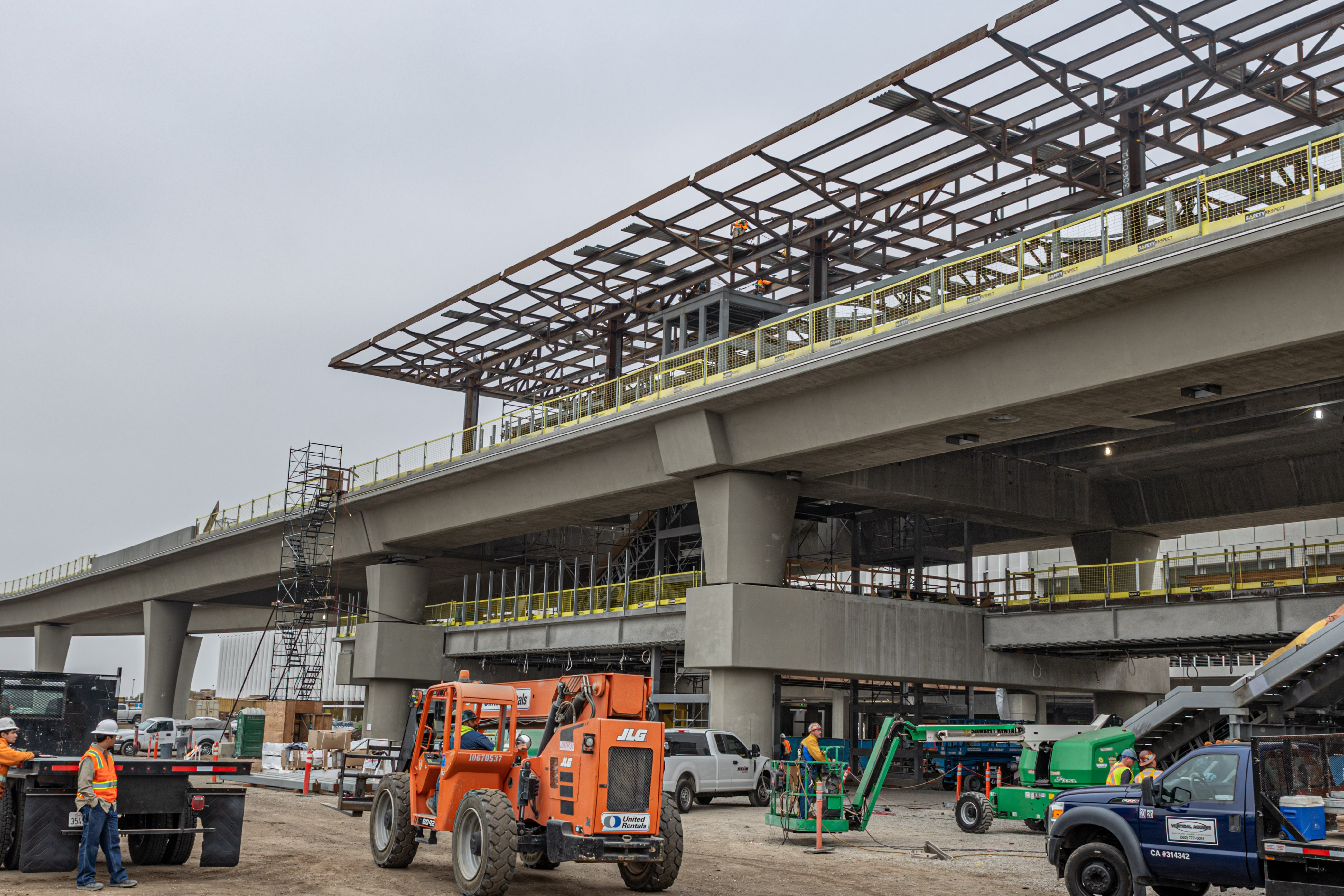 Work continues after the topping out of structural steel at the Intermodal Transportation Facility-West Station.