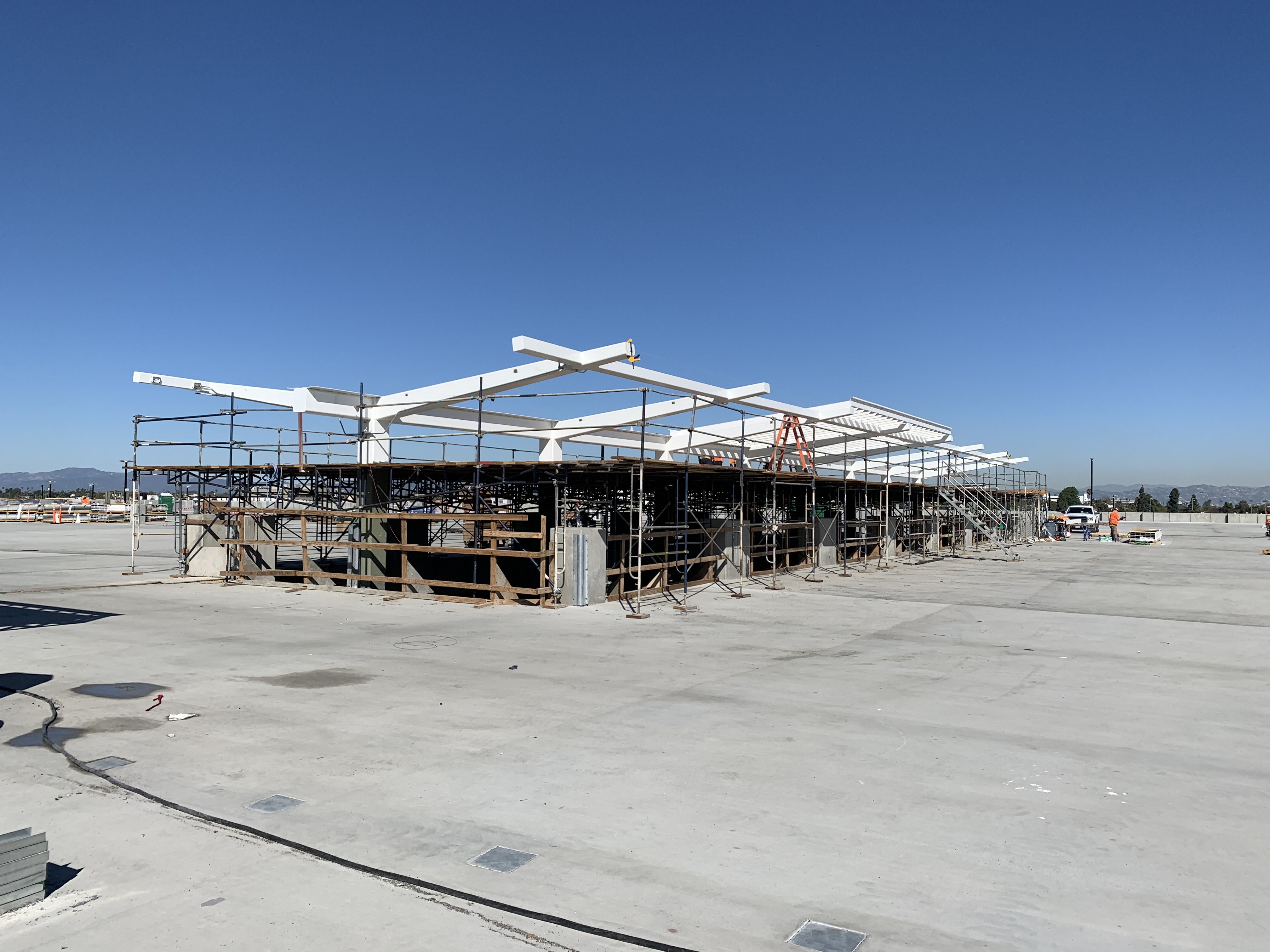 A rooftop view of the escalator canopy construction on the Intermodal Transportation Facility-West.