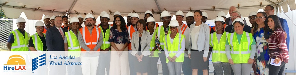 LAX CEO Deborah Flint posing for a picture with students of the Hire LAX program.